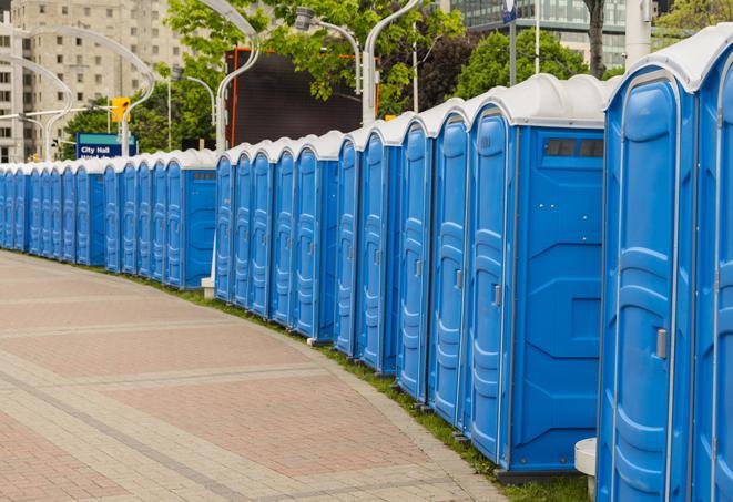 a line of portable restrooms at an outdoor wedding, catering to guests with style and comfort in Castaic, CA